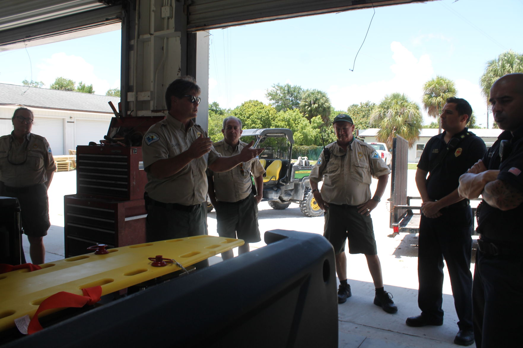 Assistant Park Manager Lu Dodson (far left), Park Manager Art Yerian (front right